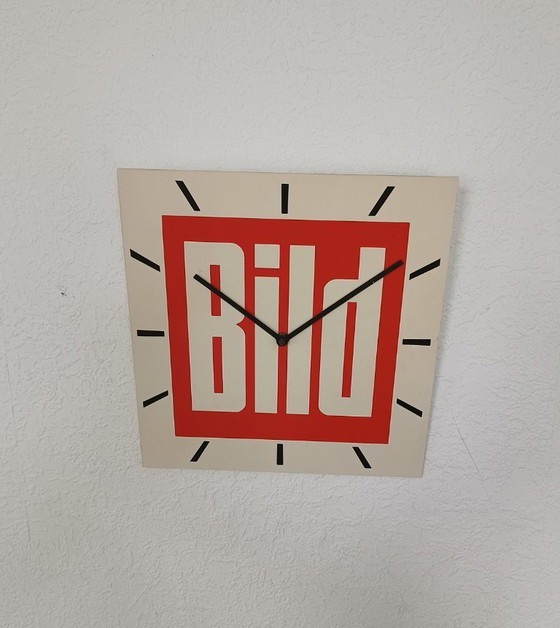 Image 1 of 1970s wall clock with advertising
