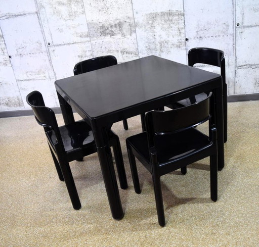 Mesa de comedor de plástico Elco de los años 60 con 4 sillas.
