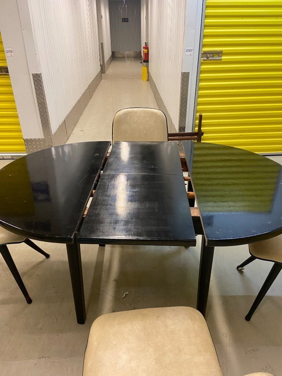 Image 1 of Dining table with 4 chairs
