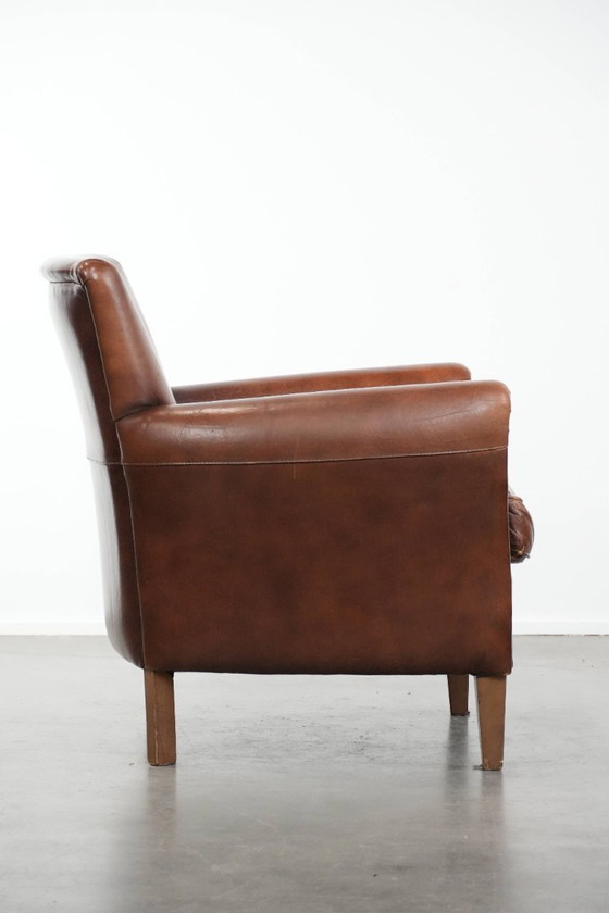Image 1 of Vintage schapenleren fauteuil/ armchair met prachtige warme kleuren