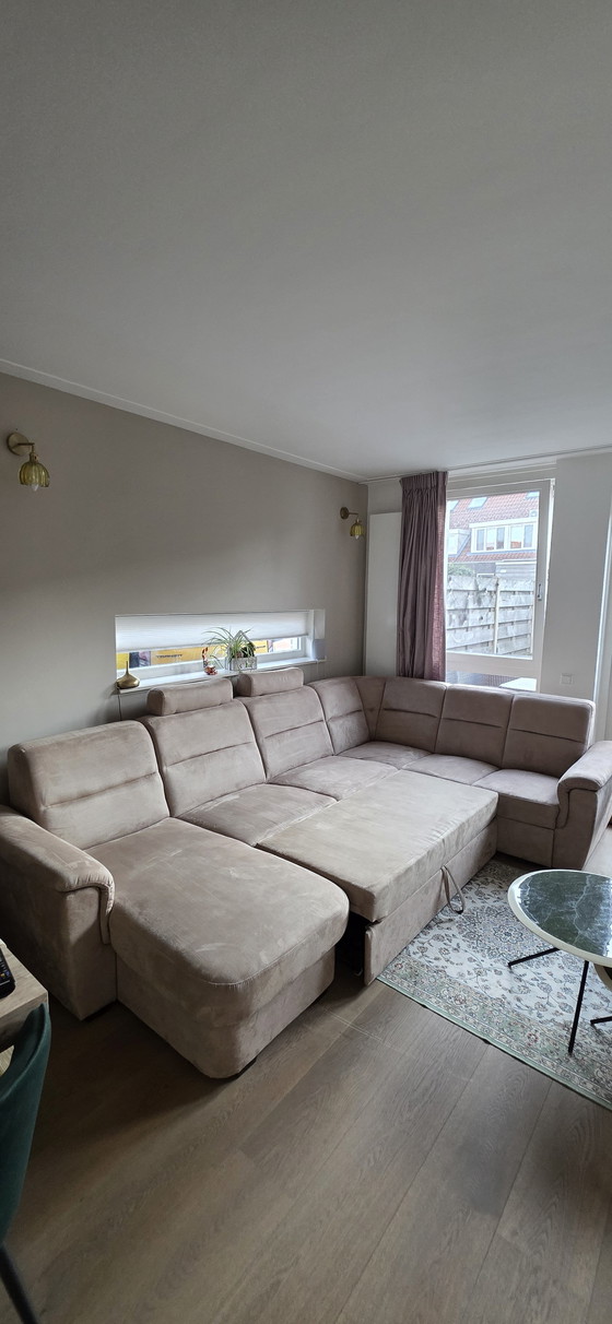 Image 1 of U-shaped sofa with sofa bed function and storage space