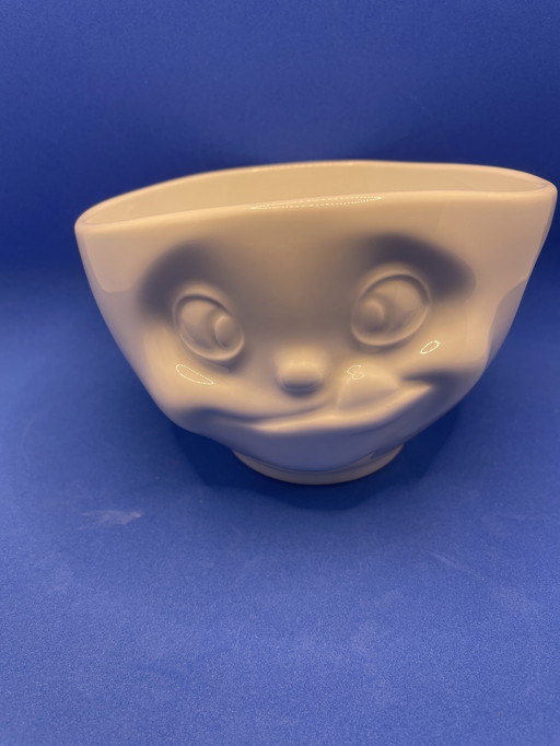 2 porseleinen kommen met gezichten