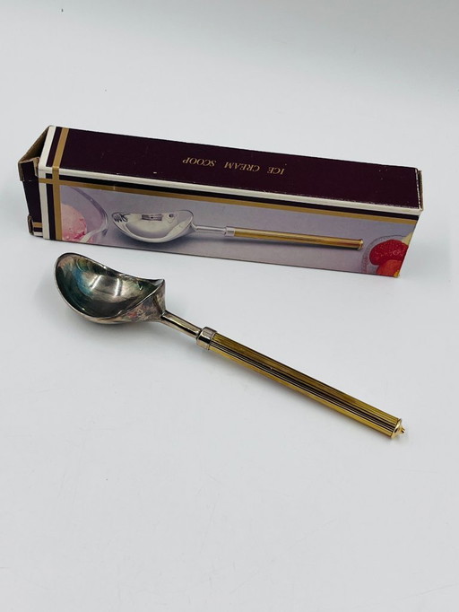 Cuchara para helado de diseño con mango dorado