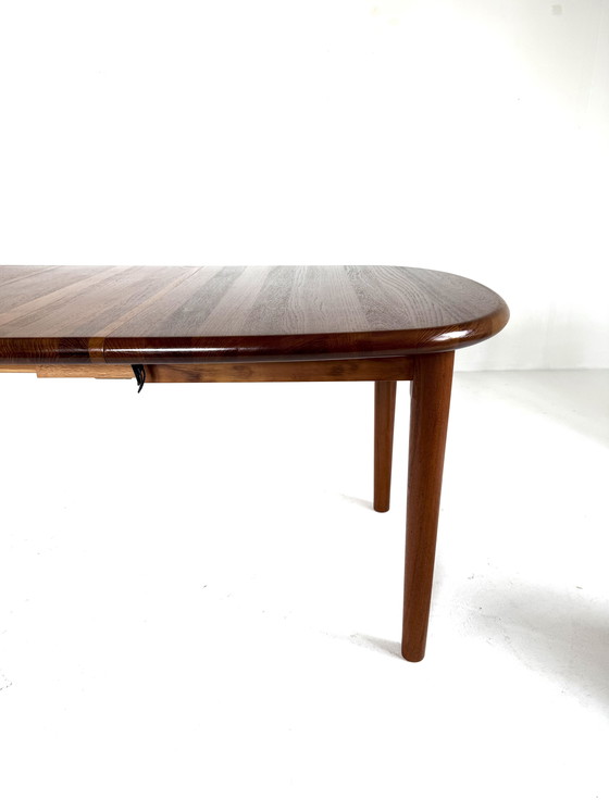 Image 1 of Vintage verlengbare Deense teakhouten eettafel ‘70