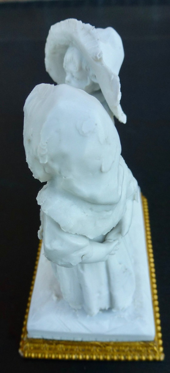Image 1 of Luxury sponge porcelain figurine with gold leaf finish.
