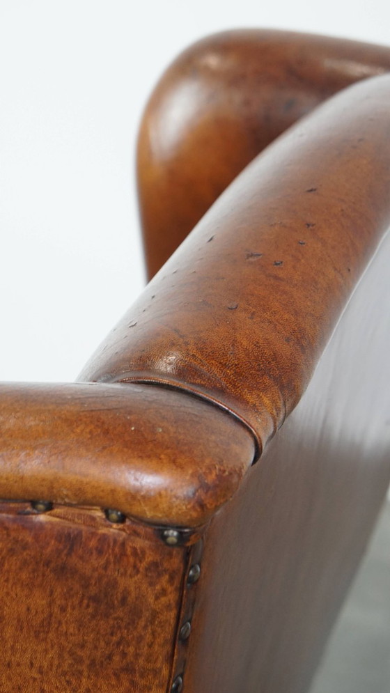 Image 1 of Grote vintage schapenleren oorfauteuil