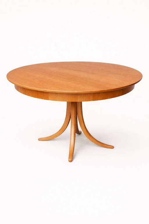 Round extendable dining table