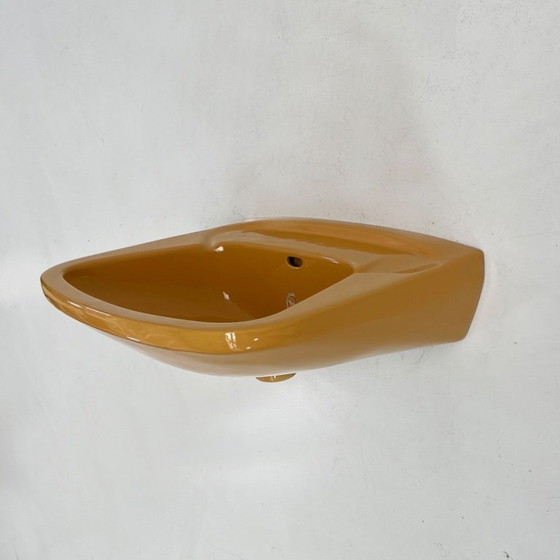 Image 1 of Vintage mosterdkleurige ronde spoelbak van Keramag Keravit, jaren 80.