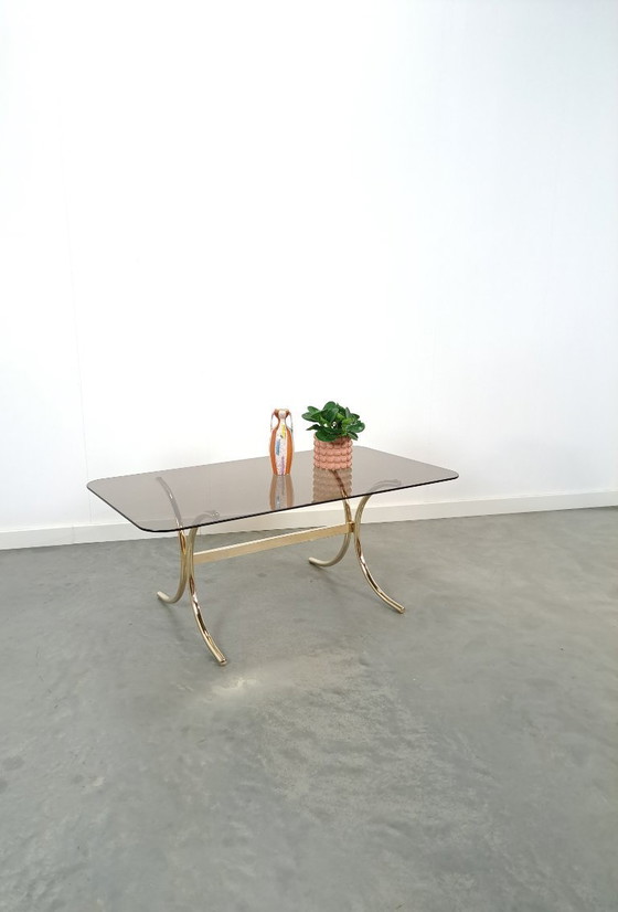 Image 1 of Tavolino in vetro fumé con gambe dorate dalla Svezia