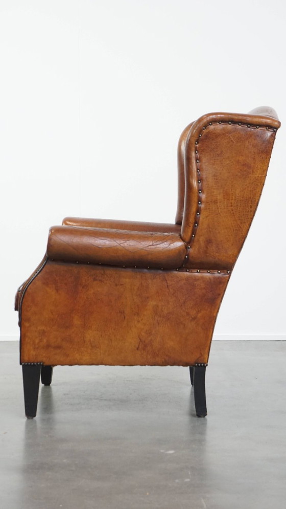 Image 1 of Grote vintage schapenleren oorfauteuil
