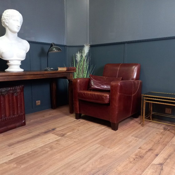 Image 1 of Timeless cowhide leather club armchair, atmospheric and inviting.
