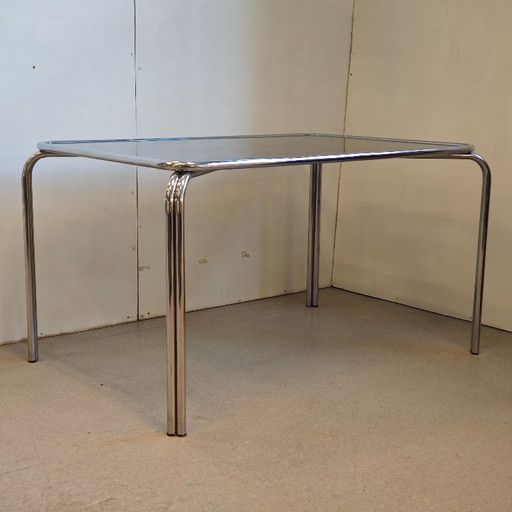 Table de salle à manger vintage en verre chromé avec cadre en tube de l'ère spatiale