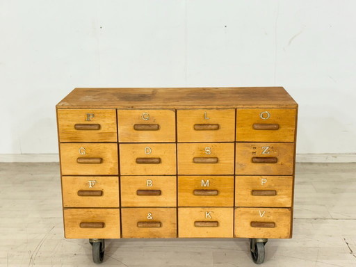 Beautiful vintage apothecary cabinet / compartment cabinet on casters – 16 compartments