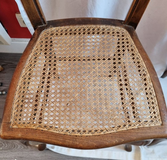 Image 1 of rotan & houten stoelen begin 20e eeuw