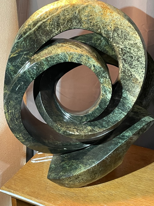 Handmade serpentine Shona sculpture by world-renowned artist Cliff Makore