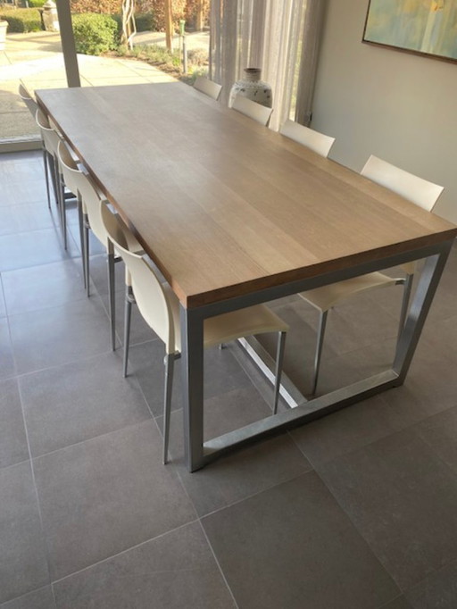 oak dining table with aluminum base
