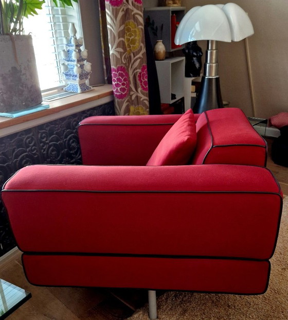 Sillón giratorio Cassina Reef rojo con ribetes de cuero. – Sillones, Leather (photo 3 of 6)
