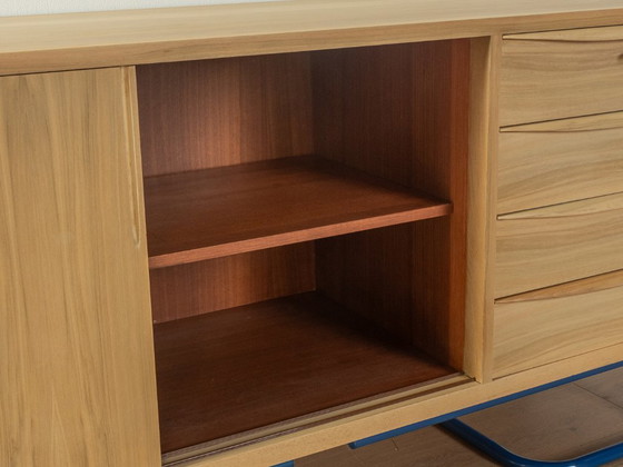 Image 1 of Dressoir uit 1950 met blauwe bauhaus poten