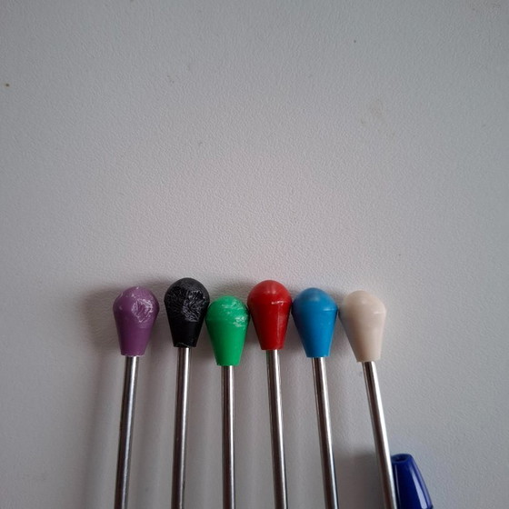 Image 1 of 1950s tonic tampers with rubber caps