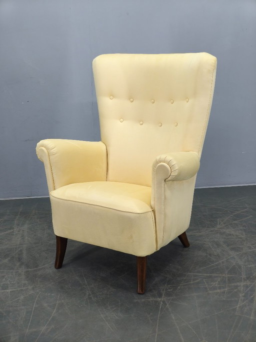 Fauteuil lounge danois à haut dossier des années 1950, récemment retapissé