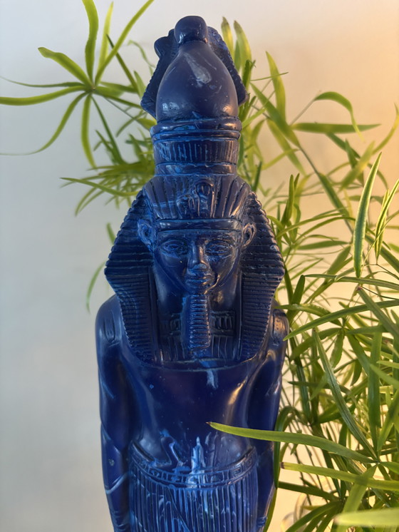 Image 1 of statue of the Egyptian god Thoth.