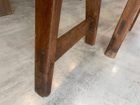 Image 1 of Twee massief eikenhouten boerenbanken van 214 cm voor een rustieke boerentafel uit de jaren 50.