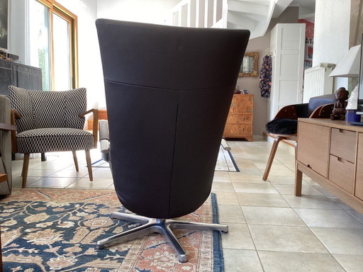 Poltrona girevole e reclinabile in pelle