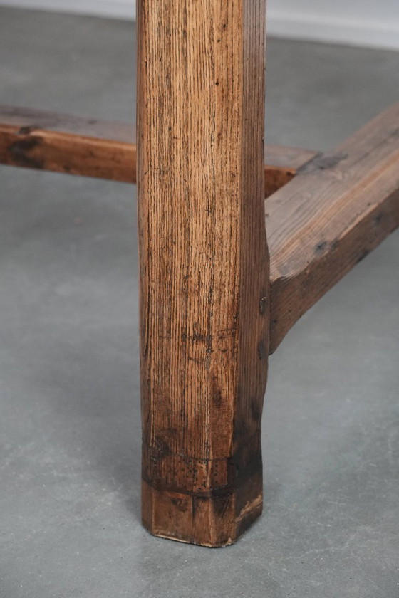 Image 1 of Robust antique French 6-person dining table made of fruit wood with 3 drawers from the late 18th century