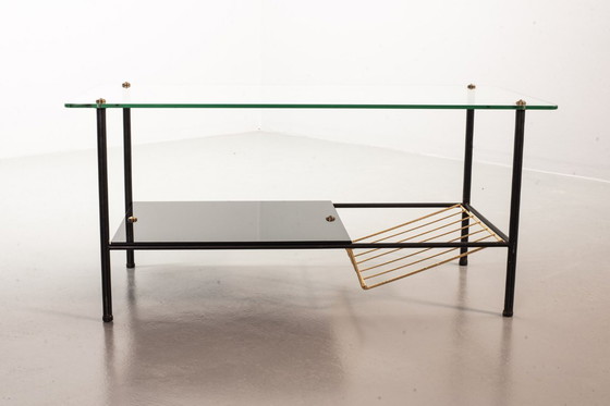Image 1 of Mid-Century Pierre Guariche Glass Coffee / Side Table for Airborne in Black Steel with Brass Magazine Holder. France, 1950s. 