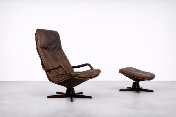 Image 1 of Vintage Mid-Century Danish Modern Brown Leather Adjustable Easy Chair & Ottoman Set from Berg Furniture, 1970s, Set of 2