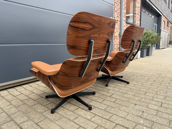 Image 1 of 2 poltrone lounge Vitra Eames XL originali con poggiapiedi, in pregiata pelle color cognac e palissandro Santos, NUOVE!!