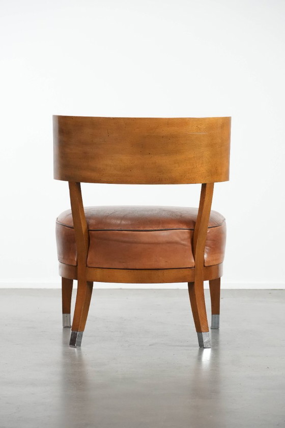 Image 1 of Vintage design armchair/cocktail chair made of sheepskin
