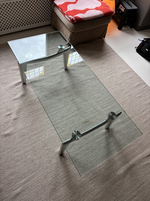 Leolux Farandole table basse en verre avec pieds en acier inoxydable