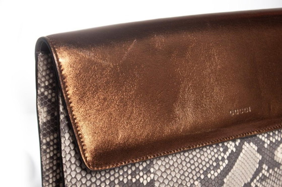 Image 1 of Gucci Clutch aus Pythonleder mit Metallklappe