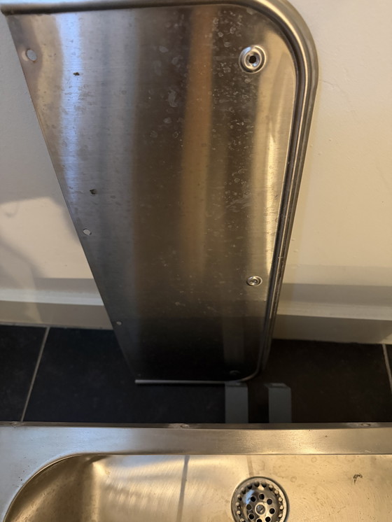 Image 1 of Sink mounted and immediately dismantled