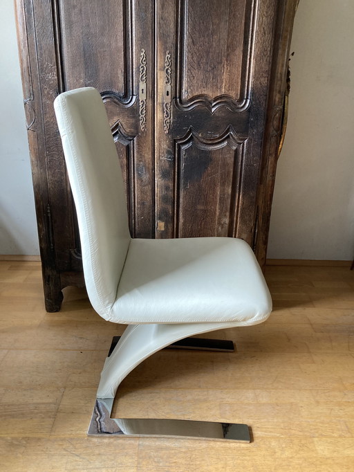 Pair of dining chairs, model "Rolf Benz 7800"