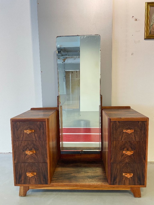 Toeletta Art Déco realizzata in impiallacciatura di palissandro con specchio originale smussato.