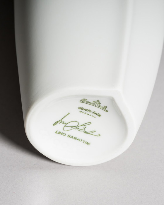 Image 1 of Curated Porcelain Duo: Lino Sabattini "Penguin" Vase (22cm) & Uta Feyl Sculptural Mini Vase – Rosenthal Studio Line, 1980s