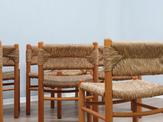 Image 1 of Juego de 8 sillas estilo Charlotte Perriand de los años 60, de paja tejida y madera.