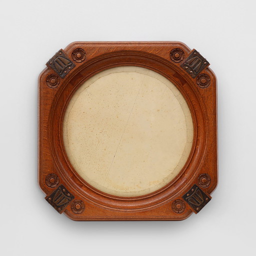 Art nouveau oak photo frame with copper decorations by Geo Verbanck