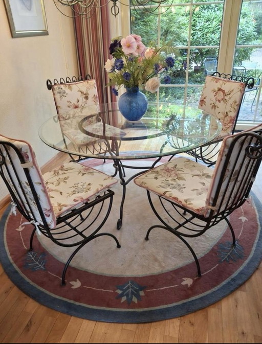 Table with glass top and 4 chairs (incl. cushion)