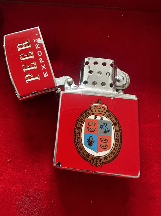 Image 1 of 9 vintage, stormbestendige benzineaanstekers met reclame-uitingen, gemaakt in de VS en Japan, waaronder 1 Zippo.