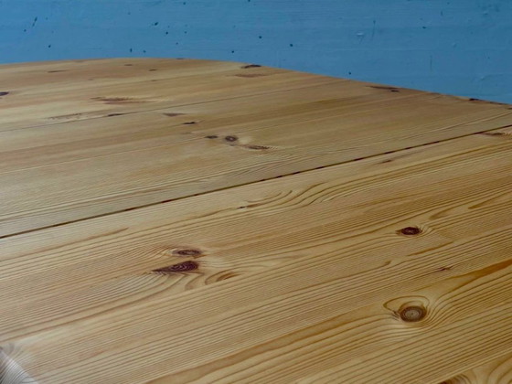 Round extendable vintage dining table made of solid pine wood, 1970s (photo 14 of 14)