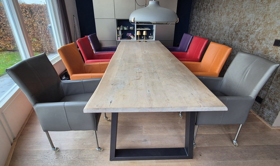 Image 1 of 8 chaises de salle à manger en cuir Vitron – 4 coloris – pieds en acier inoxydable avec roulettes