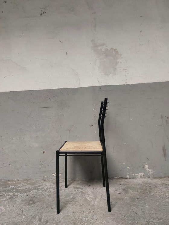 Image 1 of 4 chaises en métal avec assises en osier