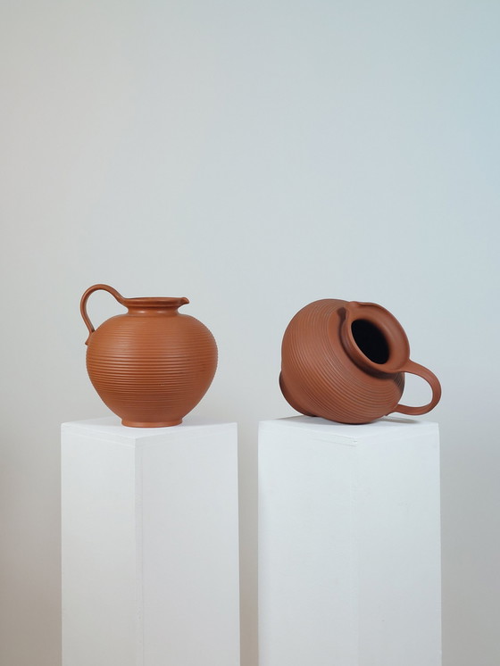 Image 1 of Pair of handmade vintage terracotta handled vases
