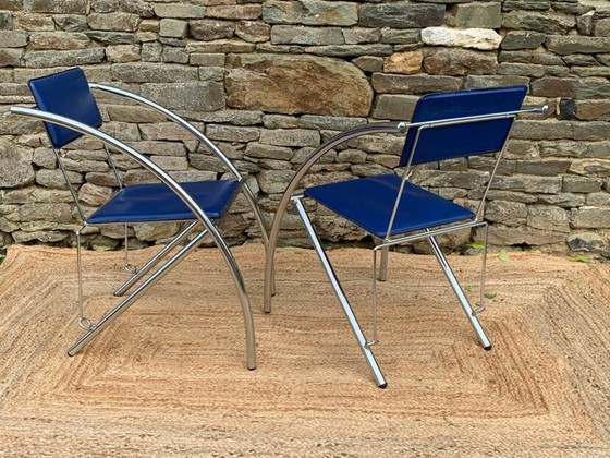 Image 1 of Set van 4 vintage stoelen in blauw imitatieleer en verchroomd metaal