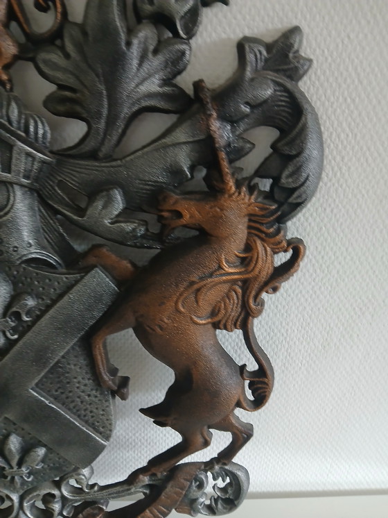 Image 1 of Placa con escudo de armas.