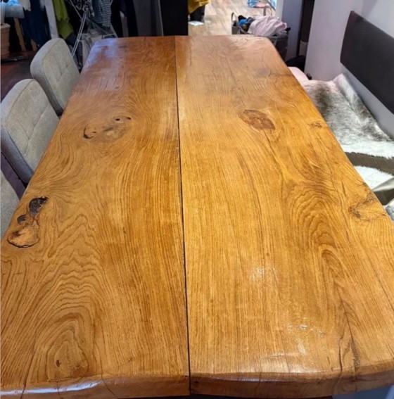Image 1 of Mesa de roble macizo con base de acero.