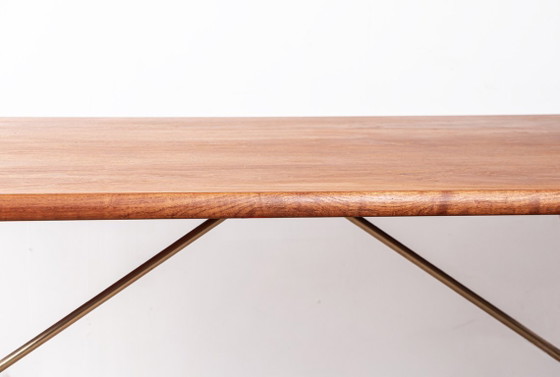 Image 1 of Deense eettafel van massief teak en beukenhout met messing, model AT 303, ontworpen door Hans Wegner voor Andreas Tuck in 1960.